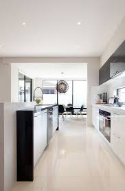 Subtle Use Of Black And Still Very Light And Bright Warm Coloured Gloss Floor Tiles Contemporary Kitchen Kitchen Design Kitchen Interior