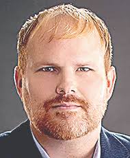 Marshall Native Remains Stuck in China