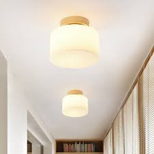 Flush mount lighting is specially made to use a number of bulbs, ranging from 1 to 3. Drum Flushmount Lighting Modern White Glass 1 Light Hallway Ceiling Flush Mount In Brass Beautifulhalo Com
