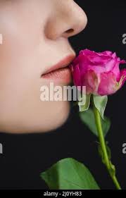 profile of charming woman with perfect face near white tiny flowers  isolated