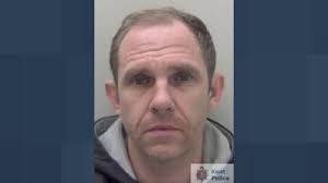 'Bully' who locked woman in flat and threw scissors at her is jailed