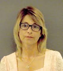 Former Car Dealer, Employee Face Fraud Charges