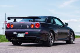 1995 nissan skyline gtr modified rare color. Midnight Purple R34 Nissan Skyline Gt R V Spec Sold For 315 187
