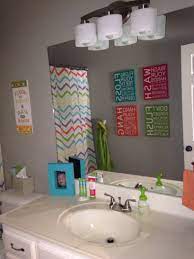 Seafoam green penny tiles cover the entire wall behind the vanity and carry over to the striped. Pin On Apartament Golescu