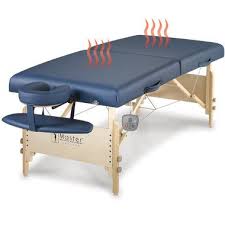 The Heated Massage Table Hammacher Schlemmer Heated Massage Massage Table Massage Room