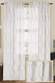 The exclusive design features hidden tabs on the back of the heading. Embroidered Wave Amore Luxury Linen Curtain Panel