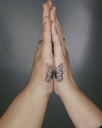 Stunning Matching butterfly tattoo on hand