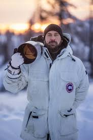 Spider: large fangs! Shiny carapace almost like a tarantula. About the  width of a poker chip with its legs stretched out. (Hay River)