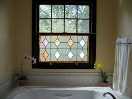 Sycamore and bevels stained glass window adding a more refined character to one's kitchen, dining room or living area, this stained glass window panel enchants with its geometric composition. Ann Wolff Glass Design Stained Glass Design Restoration