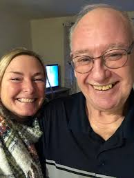 Loaded baked potatoes and fresh fruit served to the community