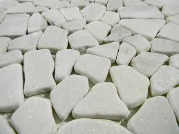 These pebbles are a product of nature, therefore there can be noticeable variances between pieces, so it is important and recommended that a range of this product be viewed before finalizing a purchase. Pebble Stone White Crystal Tumbled Glass Tile Home