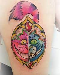 30 Cheshire Cat Tattoo Ideas To Try In December 2020 Wonderland Tattoo Cheshire Cat Tattoo Disney Tattoos