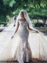 Glamorous Long Sleeves Mermaid Lace Wedding Dresses Scoop Appliques Detachable Skirt Bridal Gowns Wedding Dresses Uk Long Sleeve Wedding Dress Lace Mermaid Wedding Dresses Uk
