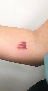 Check out flourishes it has stylized tips. 65 Colorful Cross Stitch Tattoos Designs And Ideas Tattoo Me Now