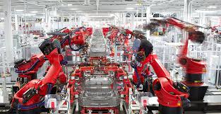 Musk dropped the surprise news during a presentation at tesla's a.i. Watch Robots And A Few Humans Build Tesla Cars Market Share