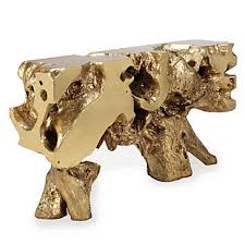 Its gold luster and glass top at the perfect touch of intrigue. Metallic Tree Trunk Decor Sequoia Console Table