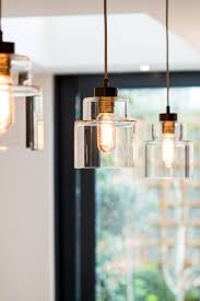Encasing the plumen 001 in a decode shade helps direct light onto the island while softening the direct glare of a bulb. Pin On Kitchen Island