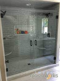 Frameless Double Swinging Doors W Oil Rubbed Bronze Hardware Frameless Shower Doors Custom Shower Doors Frameless Shower