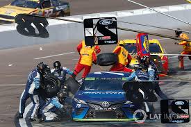 The rules that govern the pit crew and the races themselves have to change constantly and evolve as new automotive technology moves. Martin Truex Jr Furniture Row Racing Toyota Pit Stop At Phoenix Ii Nascar Cup Photos