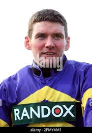 Jockey Derek Fox after winning the Randox Grand National Handicap Chase  with Corach Rambler