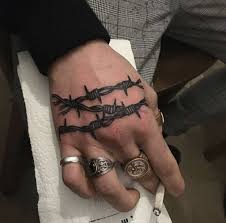 Fox in rose tattoo on hand myke chambers. Barbed Wire Tattoo On The Hand Tattoogrid Net