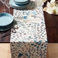 Free Shipping Shop Milla 90 Blue Embroidered Table Runner Scattered Across An Ivory Linen Cotton Embroidered Table Runner Long Table Runner Table Runners