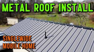Place the rubber roofing and heat seal it. Installing The Metal Roofing Mobile Home Roof Project Youtube