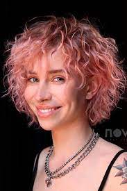 The Pink Hair Trend The Latest Ideas To Copy The Best Products To Try Curly Pink Hair Curly Hair Styles Hair Color Pink