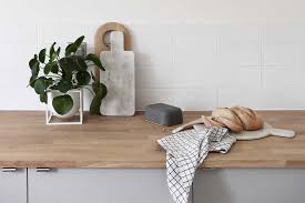 Light grey kitchen with wood worktop oil change. A Guide To Wooden Kitchen Worktops These Four Walls