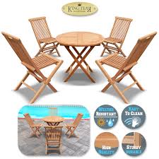 Set up chaises across the pool or anyplace you wish to relax while absorbing rays from the sun. King Teak Outdoor Golden Teak Wood 4pc Folding Chair And 1 Pc Round Table Set Patio Furniture Set Walmart Com Walmart Com