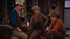 The sheriff of a small town in southwest texas must keep custody of a murderer whose brother, a powerful rancher, is trying to help him escape. Rio Bravo 1959 Deep Focus Review Movie Reviews Critical Essays And Film Analysis