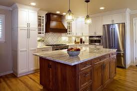 By removing a few existing walls, the achieved result was a kitchen that flowed flawlessly into the adjacent formal dining and living spaces while still retaining a generous amount of pantry and storage space with cabinetry rather than framed walls. Kitchen Design Duluth Ga Kitchen Cabinet Near Me