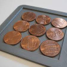 Ten pennies must fit into the square. Wooden Puzzles 10 Penny Puzzle Vintage Wooden Puzzles