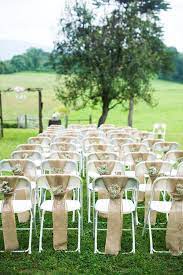 Inexpensive Folding Chairs 16 Fabulous Ways To Decorate Ctc Event Furniture Rustic Burlap Wedding Wedding Ceremony Chairs Wedding Chair Decorations