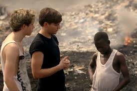Red nose day 2013 is heading your way on friday 15th march and guess who'll be unleashing their dulcet tones onto our grateful ears for the official it's only one direction! Niall Horan Louis Tomlinson Of One Direction Scavenge For Trash In New Red Nose Day Video