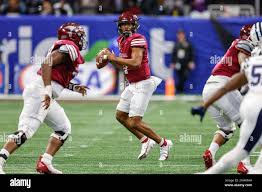 December 17, 2022: NC Central's Davius Richard (11) looks for a receiver  during the Cricket Celebration Bowl, featuring the Jackson State Tigers and  the North Carolina Central Eagles, played at Mercedes-Benz Stadium