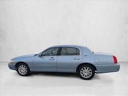 Image result for Light Ice Blue 2005 Town Car