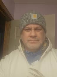 What could cause red diarrhea in chickens?