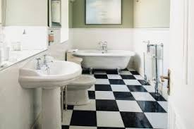Design ideas for a victorian half tiled bathroom in los angeles with a pedestal sink and green tiles. Art Deco Bathrooms A Comprehensive Guide To Styling Lovetoknow