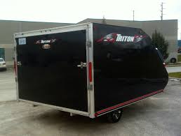 For snowmobilers what you tow and what you tow with are as important as the type of snowmobile you ride. Tc118 Snowmobile Trailers Triton Review Intrepid Snowmobiler