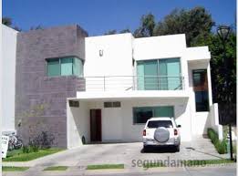 Fachada de una casa moderna con terraza. Fachada Minimalista Con Pequena Terraza House Styles House Mansions