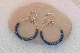 Fun diy tassels added to hoop earrings. Make Wire And Bead Hoops For Every Mood And Outfit
