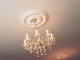 Such a design brings the focus upward to visually stretch the room, and adds interest in an otherwise bland space. How To Choose The Right Ceiling Medallion