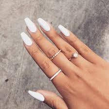 Tapered coffin nails are a popular request at nail salons. White Nails Coffin Short Nailstip