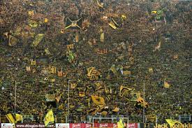 At 328ft long and 131ft high, the südtribüne of one of world football's most magnificent venues packs in. Borussia Dortmund S Yellow Wall Sports