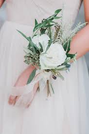 Prom flowers bridal flowers green flowers wrist corsage wedding wedding bouquets wedding wristlet mother of the bride flowers mother of the bride corsages white bridal flowers wrist corsage bracelets this wonderful flower corsage will be the perfect jewelry for your romantic wedding. 20 Floral Corsages For Mothers Of The Bride And Groom Martha Stewart