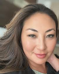 You have a very unique and beautiful look. Stunning would be the word I'd  use. It would be interesting to see a picture of you as a child.