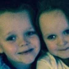 Third person charged with murder after four children die in Salford house  fire