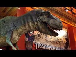 The ferris wheel at the toys r us store in new york's times square is seen. Cant You See This Walking Around My Front Yard 20ft Animatronic Jurassic Park T Rex Toys R Us Times Square Jurassic Park T Rex T Rex Toys Jurassic Park
