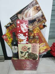 Next, i used the cap of a toothpaste to form the circle pattern on top of each cookie. Chinese New Year Hampers Dr Koh